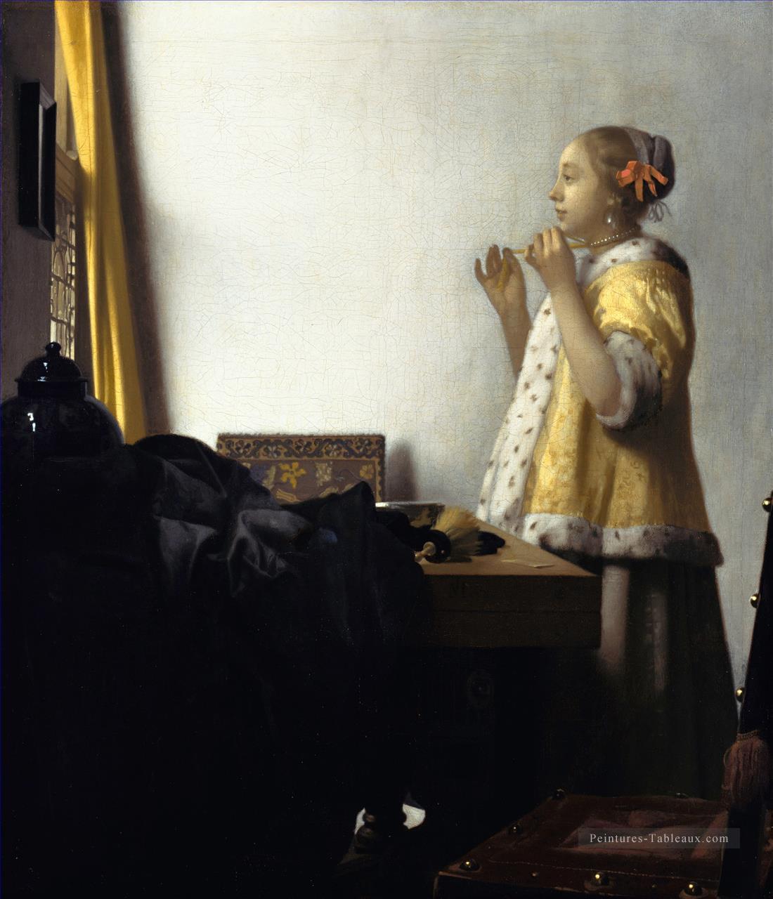 Femme avec un collier de perles Baroque Johannes Vermeer Peintures à l'huile
